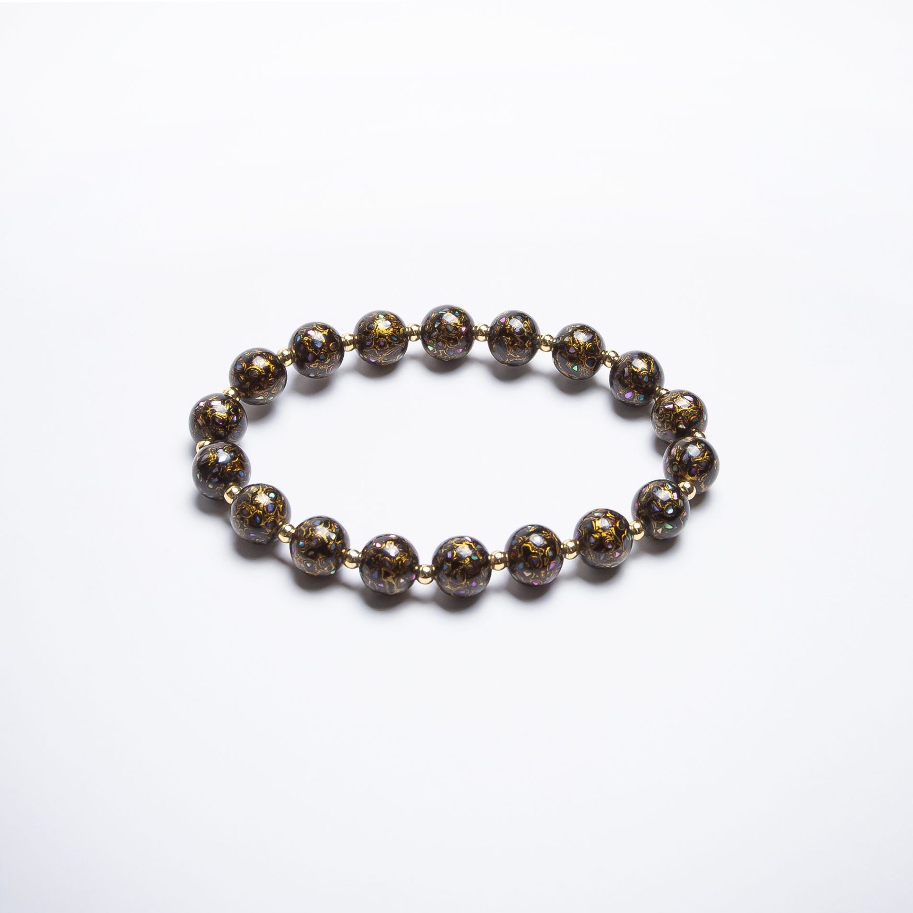 Obsidian lacquer bracelet – A minimalist black lacquer bangle, handcrafted using traditional Chinese lacquerware techniques, exuding sophistication and timeless elegance.